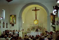La santa messa celebrata nella chiesa di Capoliveri